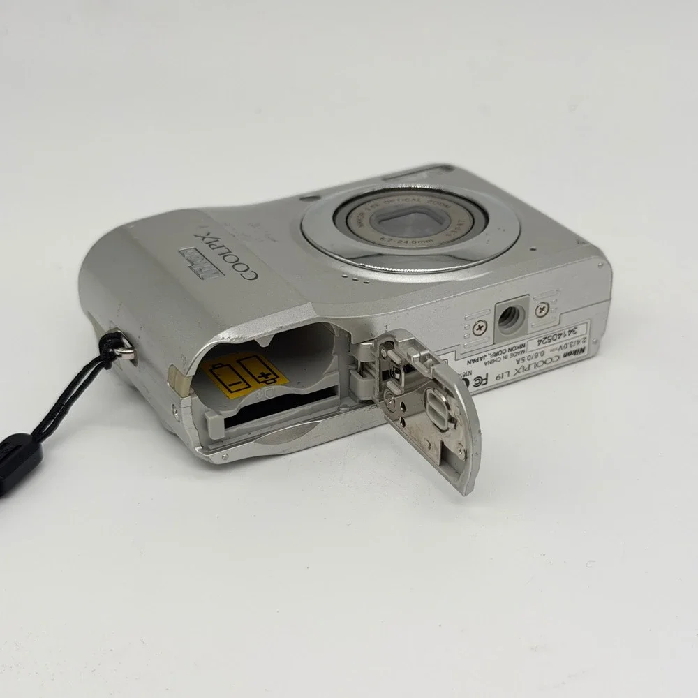 Nikon battery door